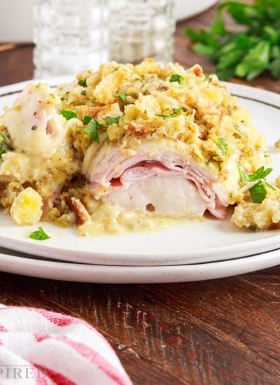 two stacked plates with crockpot chicken cordon bleu