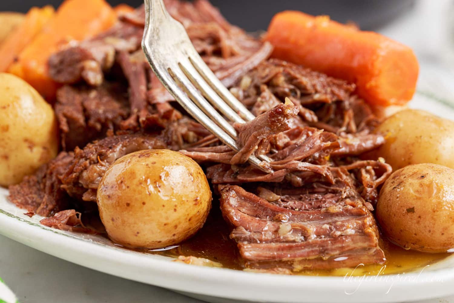 front close up of instant pot pot roast with a fork