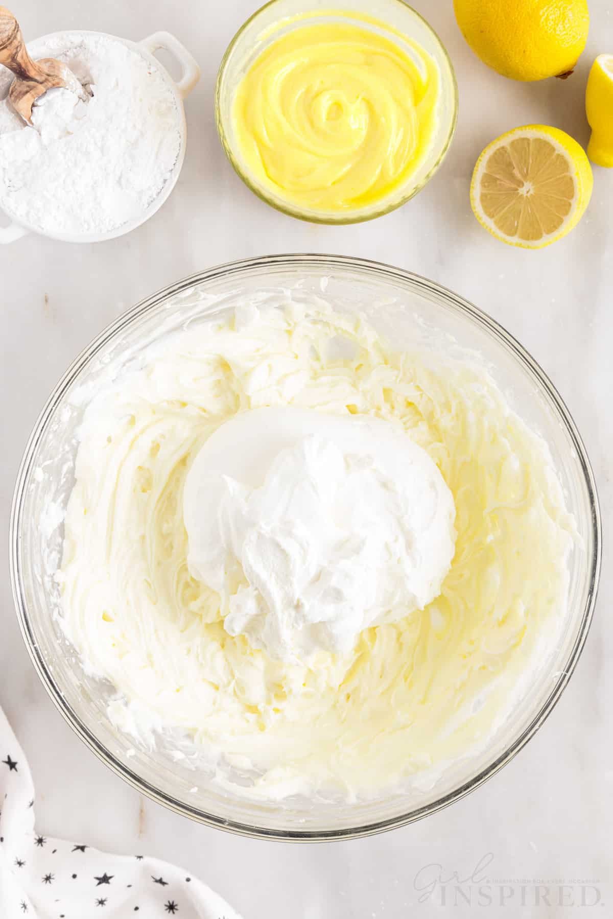 whipped cream added to cream cheese mixture to make lemon cream cheese pie