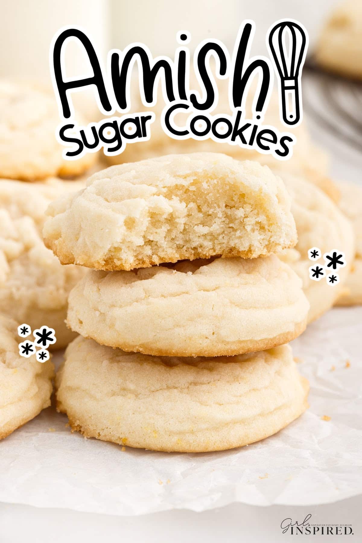 Stack of Amish sugar cookies on a sheet of parchment paper with text title.