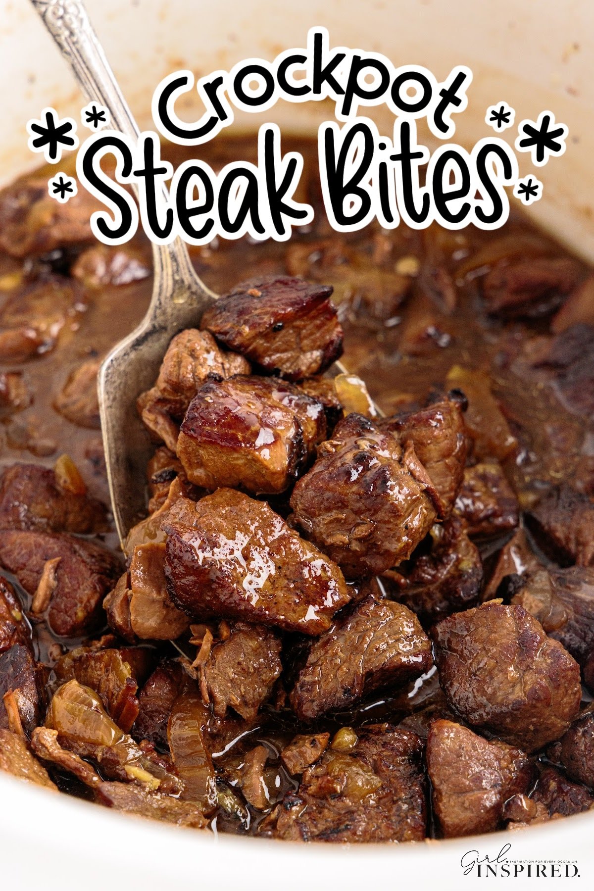 Spoon lifting cooked crockpot steak bites from crock, with text title overlay.