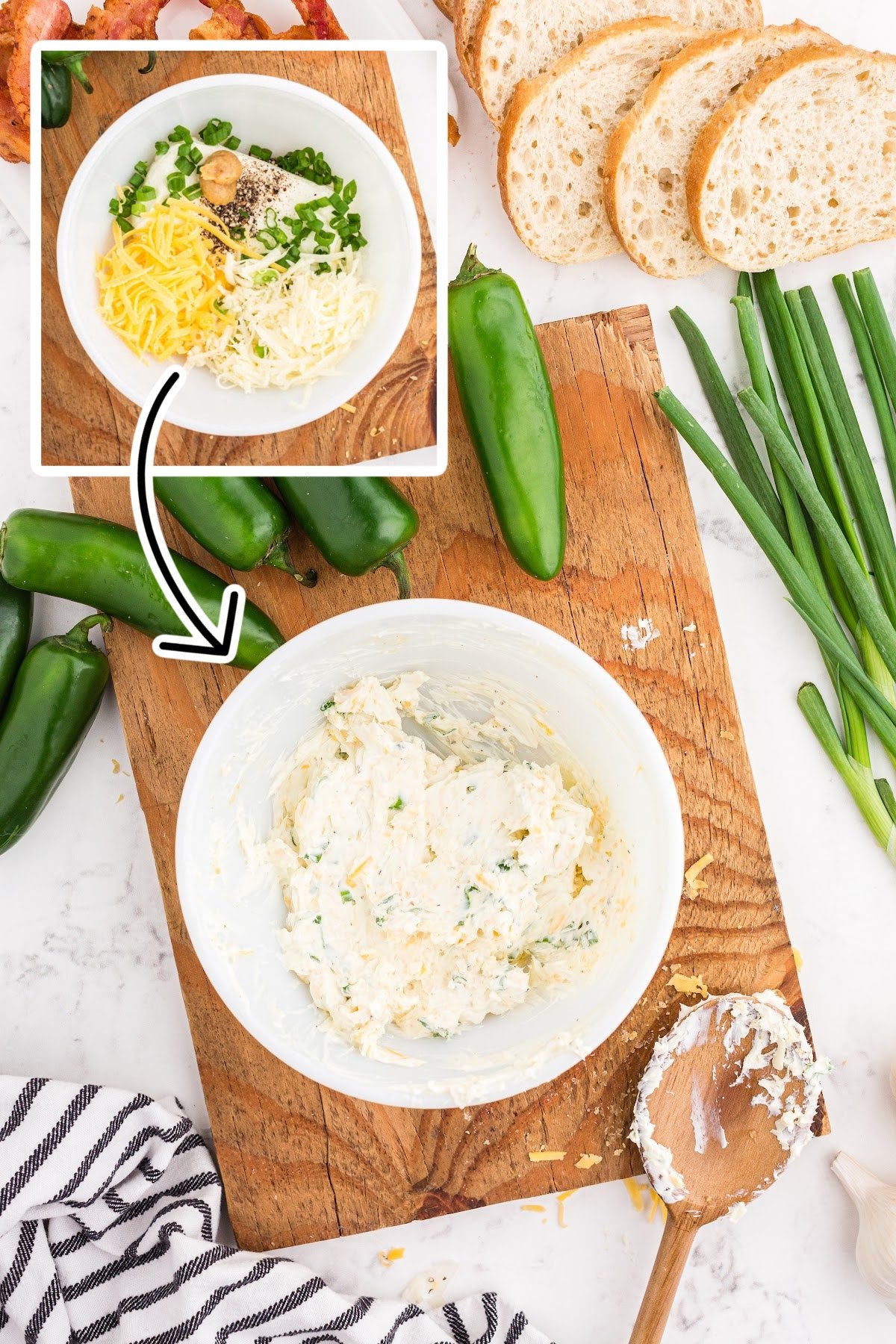 Cheese, cream cheese, green onions in a bowl and mixed together in the bowl.