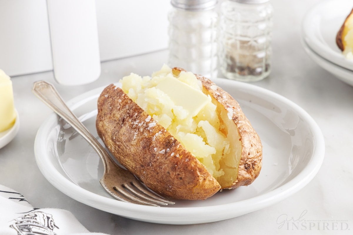 air fried potato on a plate with a fork