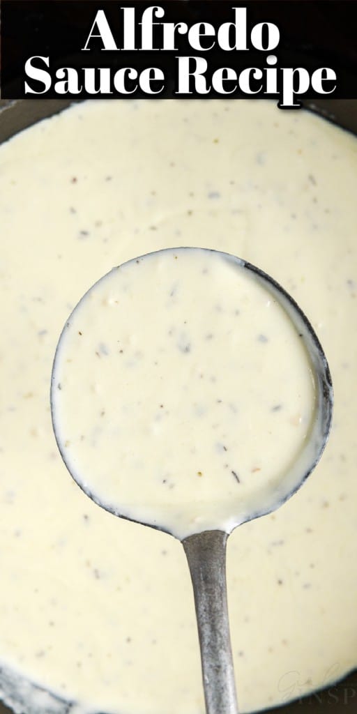 a ladle full of alfredo sauce scooped out from a sauce pan