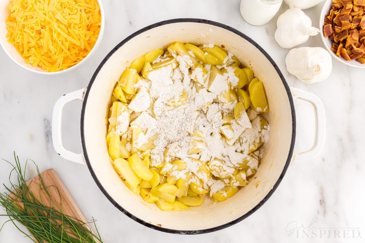 flour added to potatoes in dutch oven