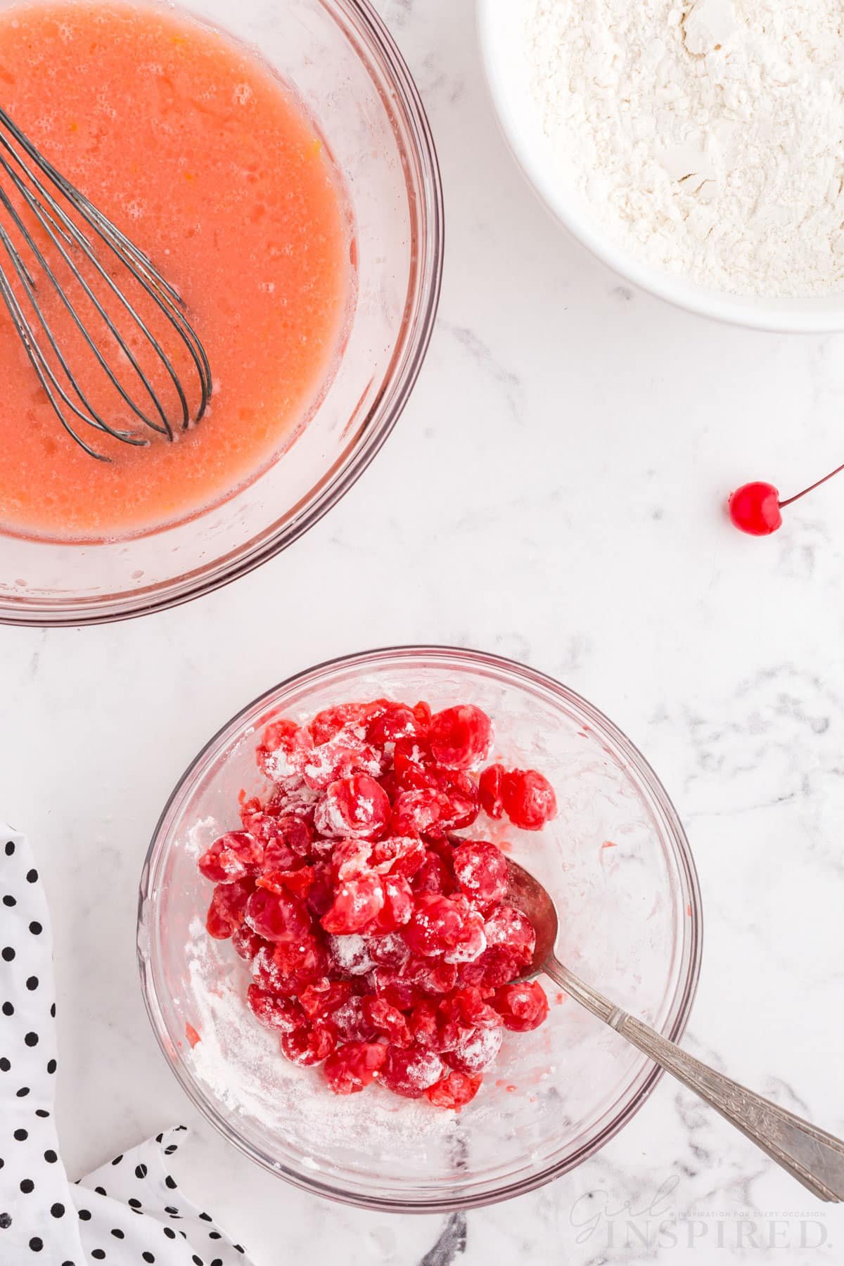 flour mixed into cherries next to cherry juice mixture and flour for cherry bread