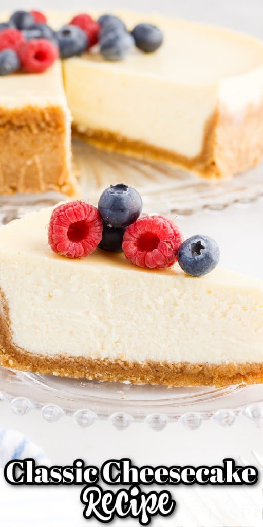 a slice of classic cheesecake with berries on top served on a glass plate