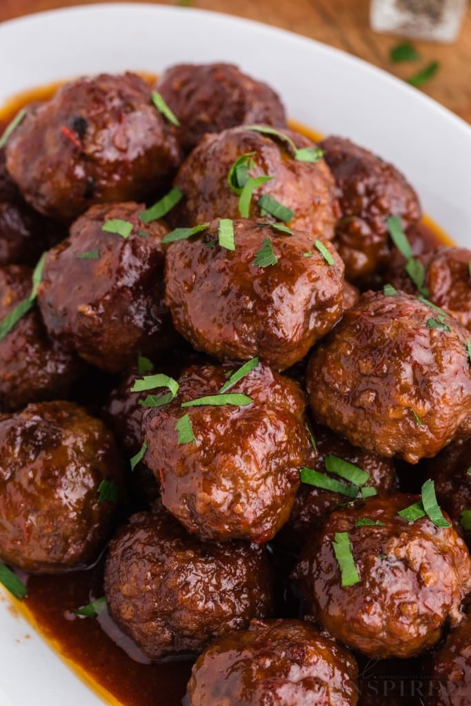 Crockpot Meatballs with Grape Jelly girl. Inspired.