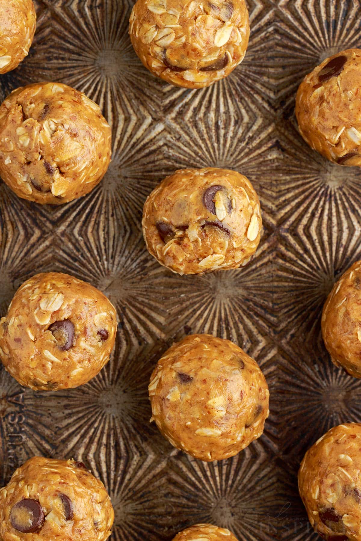 close up of cookie sheet of no bake energy balls