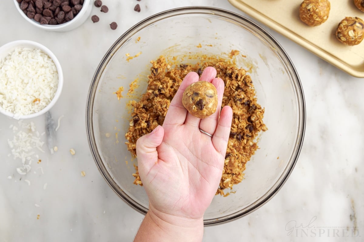 no bake energy ball dough rolled into a ball