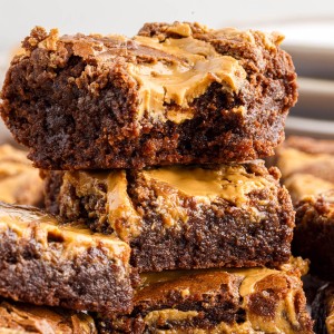 Close up of stacked peanut butter brownies.