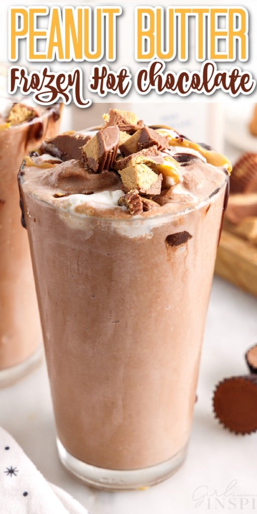 a glass full of peanut butter frozen hot chocolate with another glass in the background