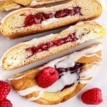 close up of raspberry cream cheese danish slices on their sides