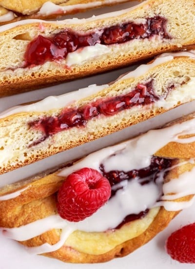 close up of raspberry cream cheese danish slices on their sides