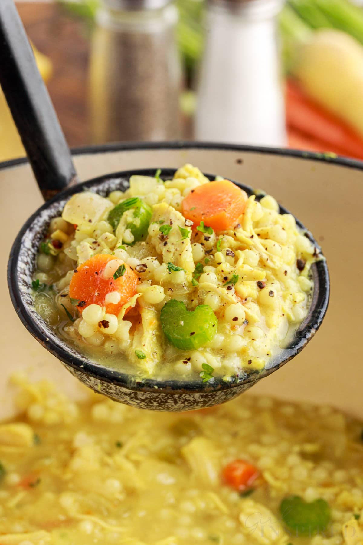 ladle of chicken couscous soup