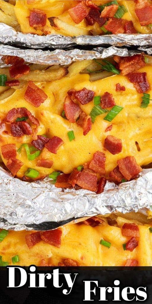 Close up of dirty fries in foil packets.