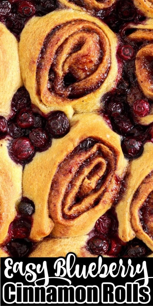 overhead close up shot of baked blueberry rolls in a 9x13 baking dish