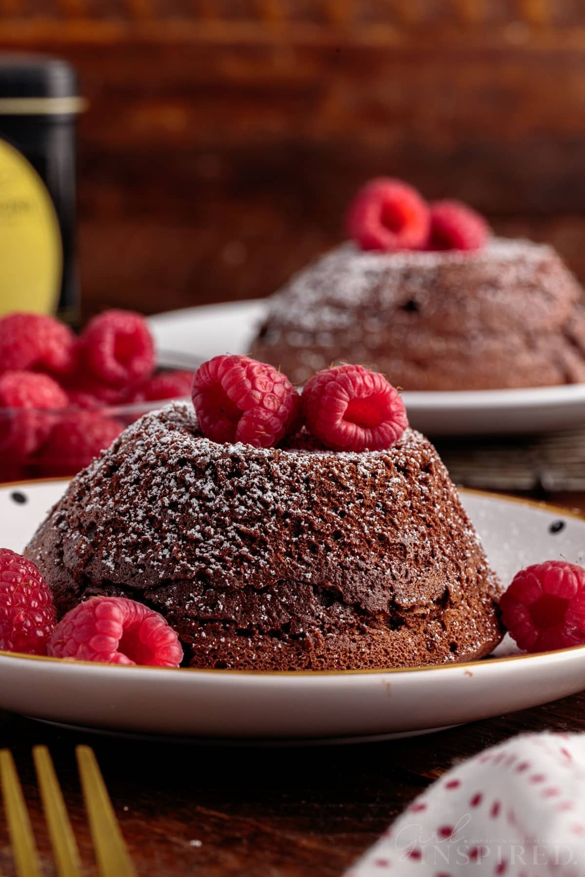 Front view of three Molten Lava Cakes on plates.