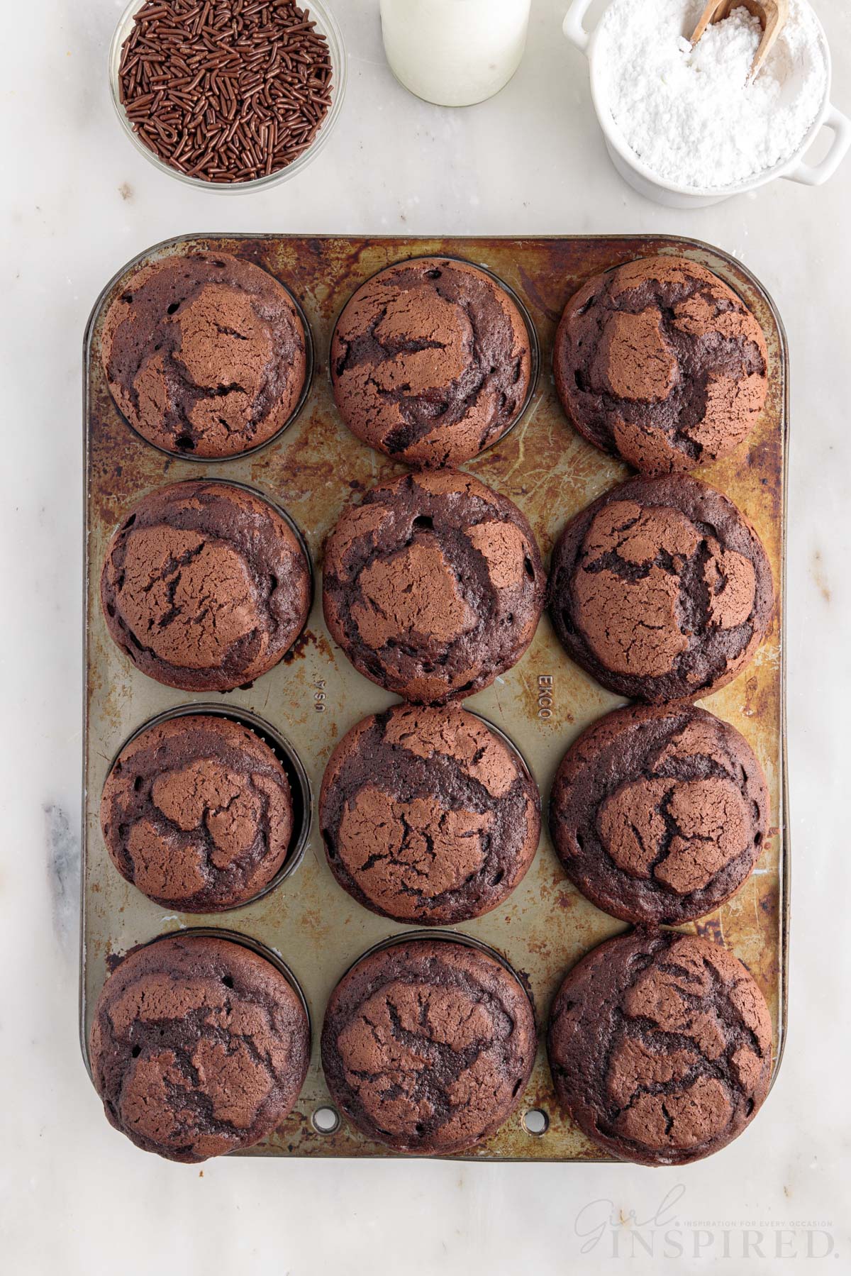 Nutella Cupcakes in cupcake pan after being baked.