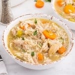 Old Fashioned Chicken and Rice Soup in two soup bowls.