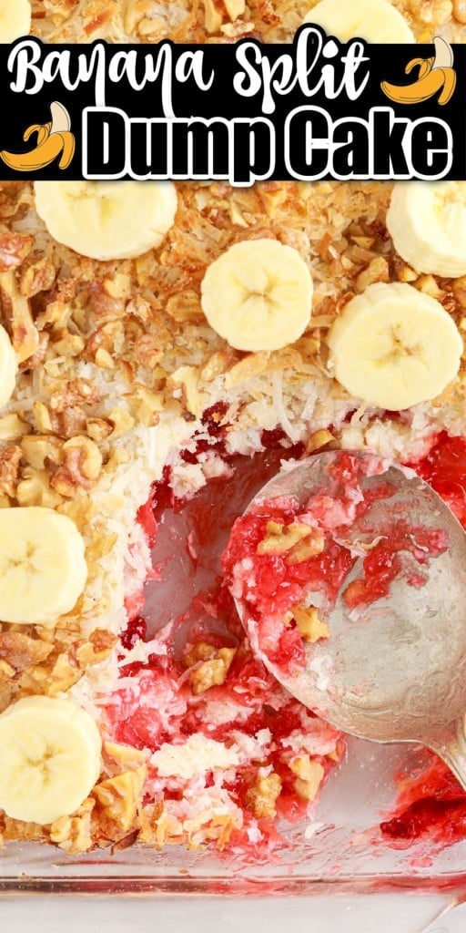 Top close up of spoon inserted in banana split dump cake with a scoop missing.