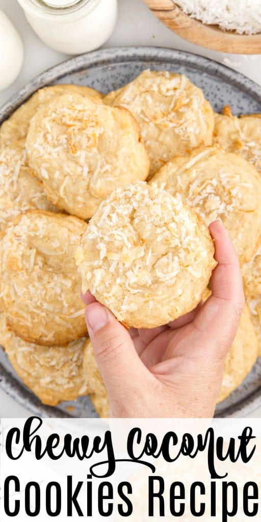 Chewy Coconut Cookies on a plate on being held above the plate.