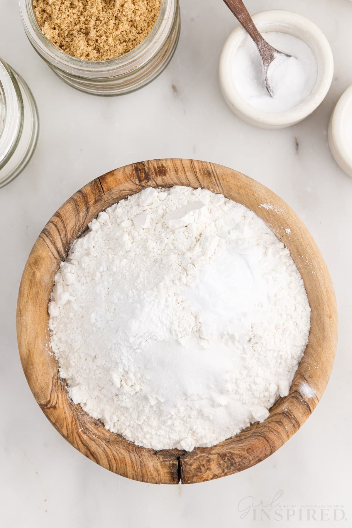 Flour, baking soda, cream of tarter, and salt in a bowl.