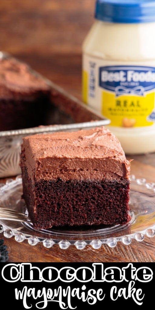 Front view of a slice of Chocolate Mayonnaise Cake on a plate with mayonnaise in the background.