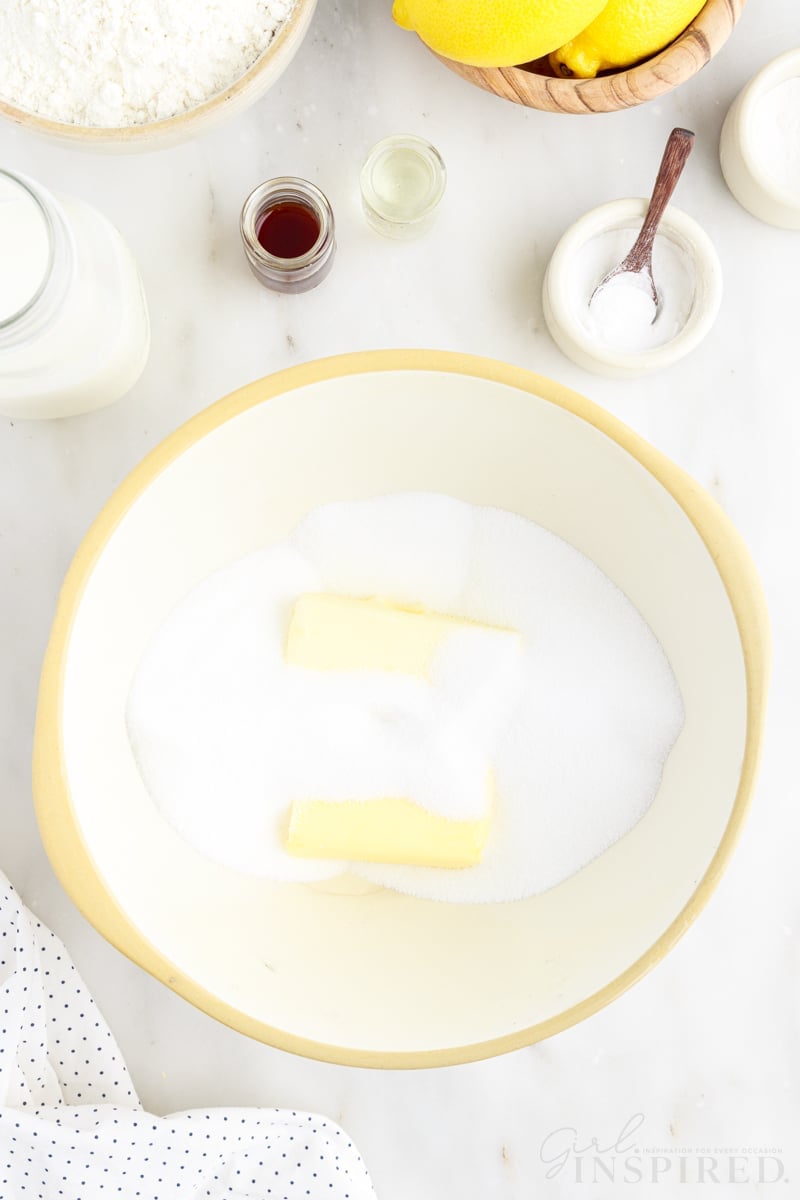 Butter, sugar, and shortening in a mixing bowl to make Lemon Layer Cake.