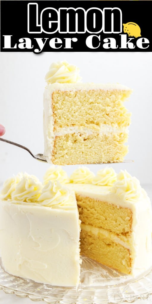 Front view of lemon layer cake on a glass dish with a slice removed and held up on a cake server