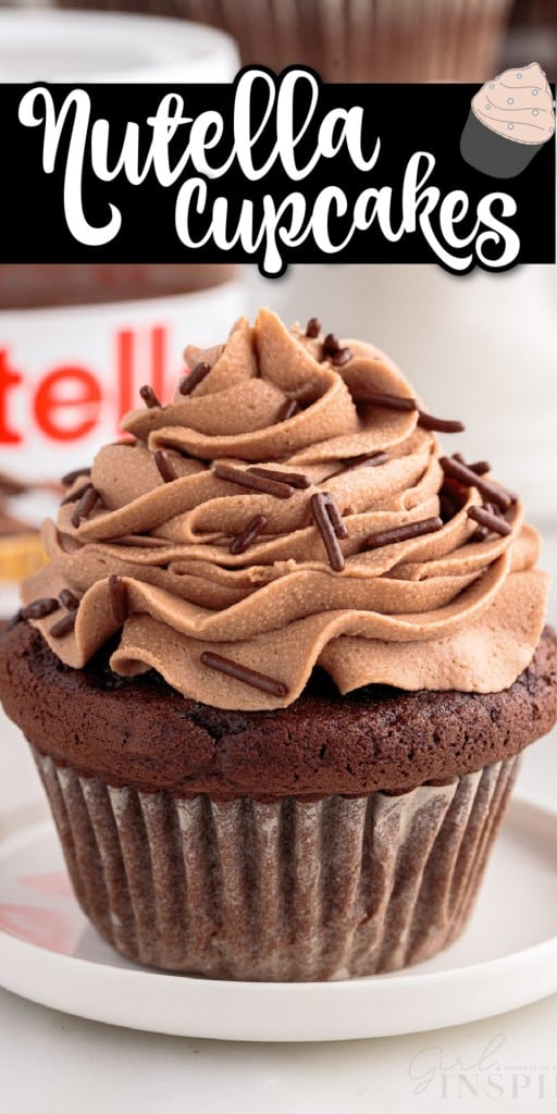 Nutella Cupcake on a small white plate with a bottle of Nutella in the background.
