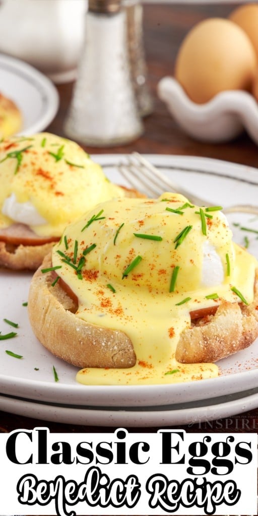 Front close up of Classic Eggs Benedict on a plate with a fork.