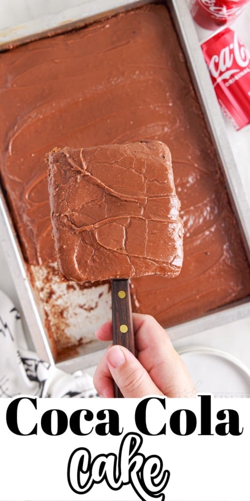 A square slice of Coca Cola Cake being lifted from the 9x13 pan.