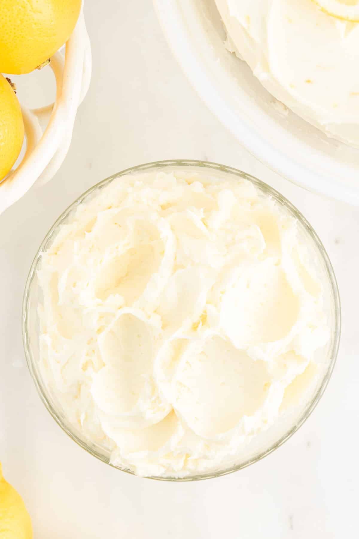 Overhead view of Lemon Buttercream Frosting in a bowl.