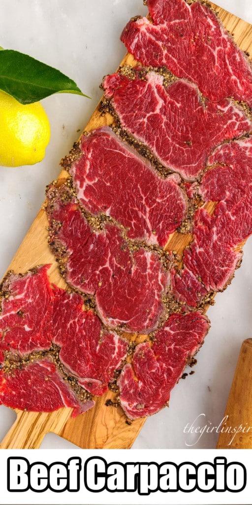 Overhead view of Beef Carpaccio sliced on cutting board.