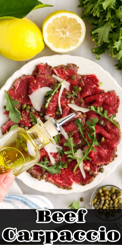 Oil drizzled over Beef Carpaccio on a plate.