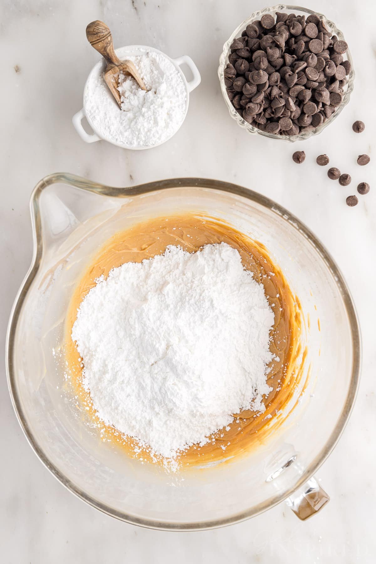 Powdered sugar added to the peanut butter mixture.