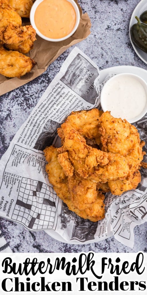 Overhead shot of Buttermilk fried chicken tenders on newspaper wrapping.