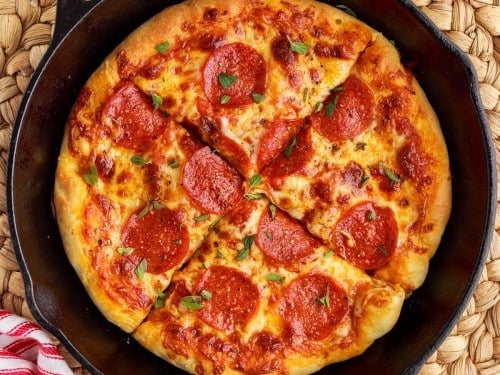 https://thegirlinspired.com/wp-content/uploads/2023/04/Cast-Iron-Pizza-17-500x375.jpg