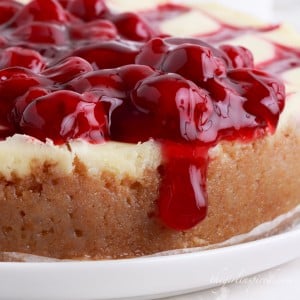 Zoomed in view of Cherry Cheesecake with cherry topping.