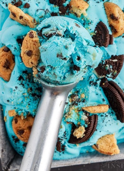 A scoop of Cookie Monster Ice Cream on top of the loaf pan.