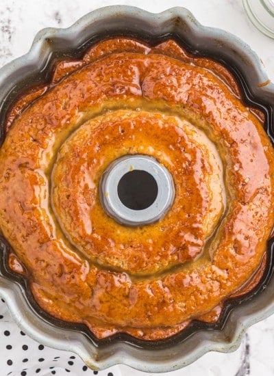 Overhead view of baked crack cake with glaze on top