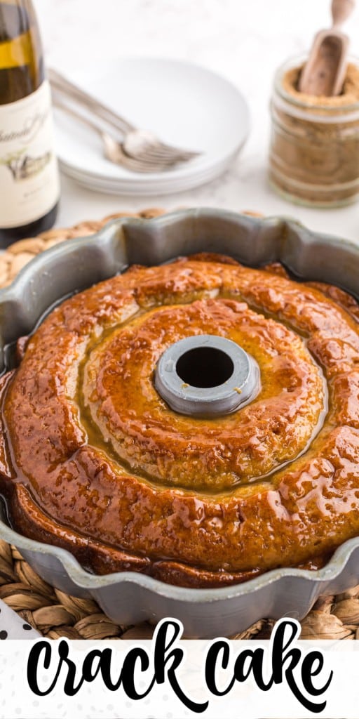 Freshly baked and glazed crack cake in a bundt pan.