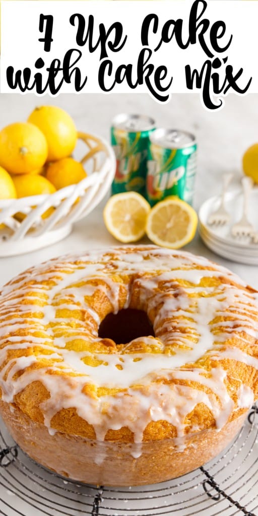 Front view of 7-Up cake with cake mix with a basket full of lemons and cans of 7-Up in the background