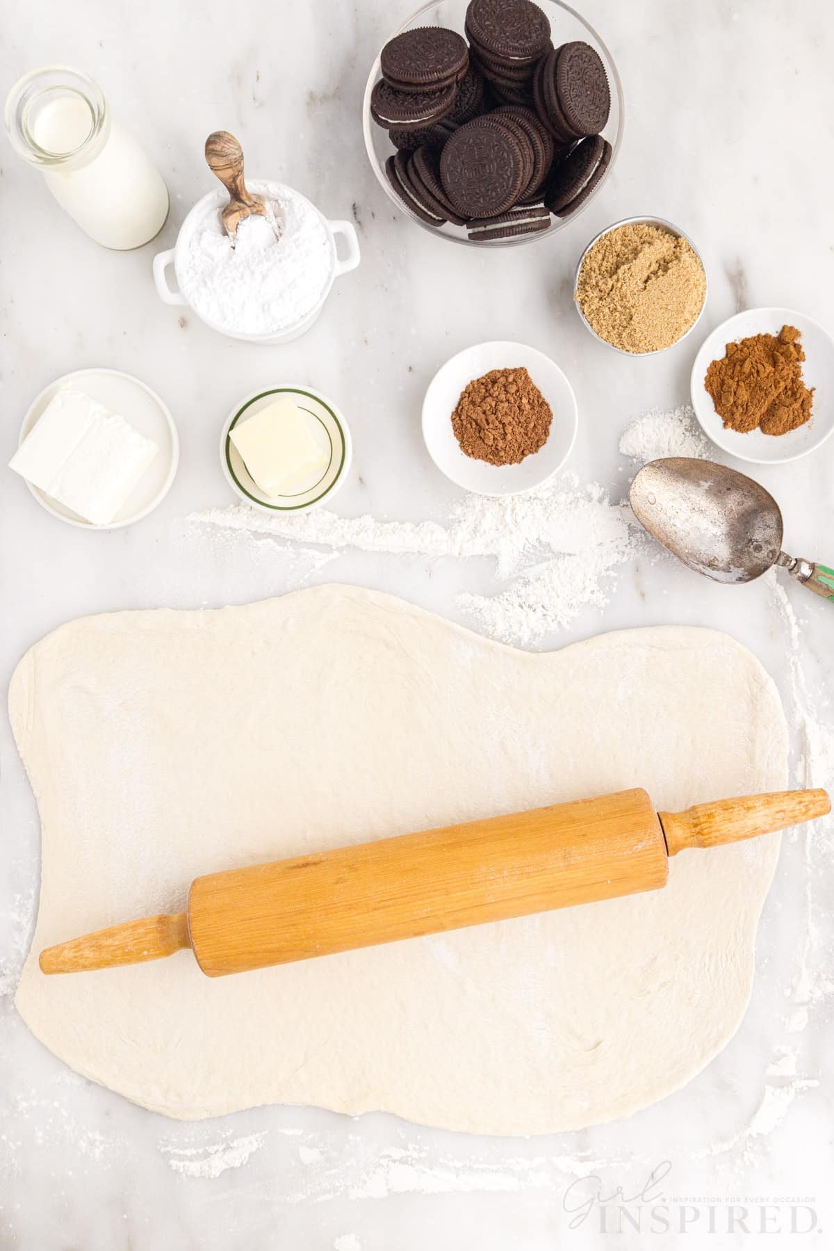 Dough rolled out for Cookies and Cream Cinnamon Rolls.