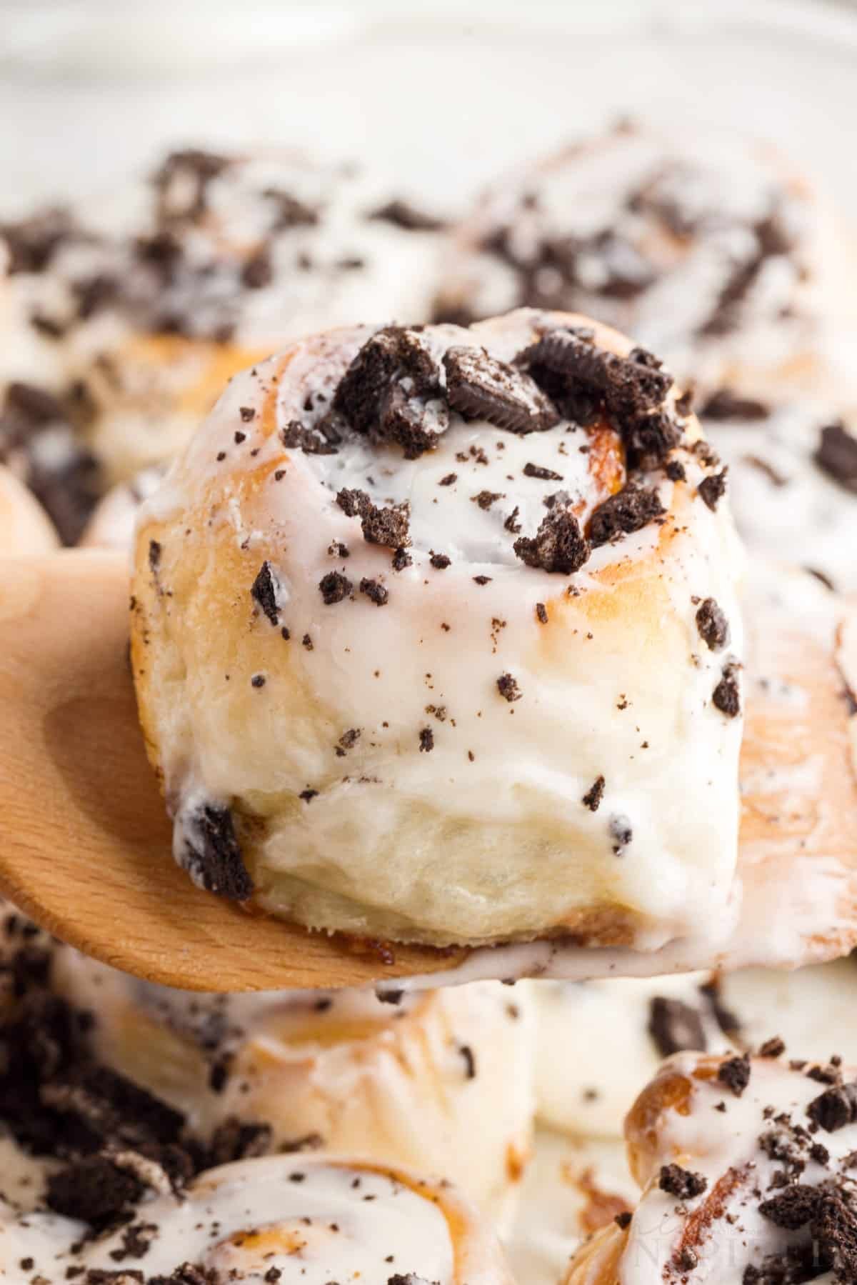 Cookies and Cream Cinnamon Roll on a spatula.