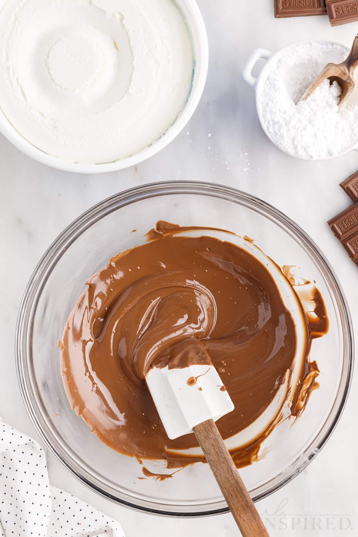 Hershey bars after being melted in a mixing bowl.