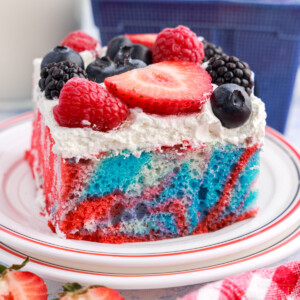 A slice of Red White and Blue Marble Cake on a dish.