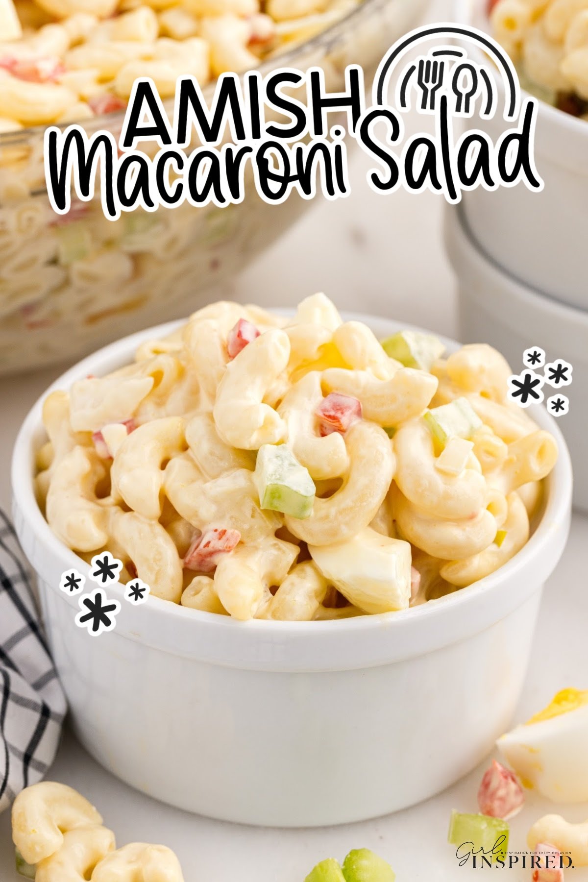 A small dish of Amish Macaroni Salad with text overlay.