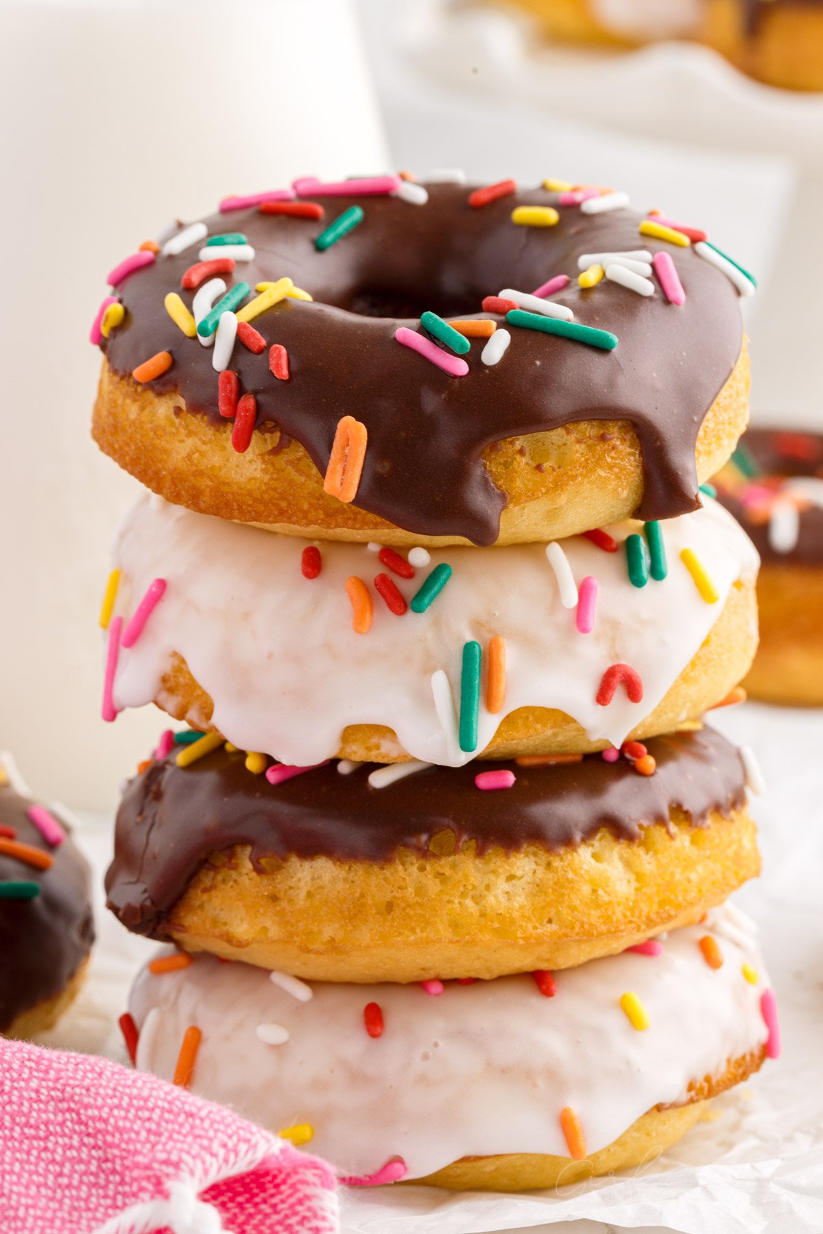 Cake Mix Donuts stacked on top of each other.